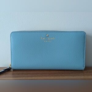 Kate Spade New York Leila Large Continental Wallet in dusty blue pebbled leathe